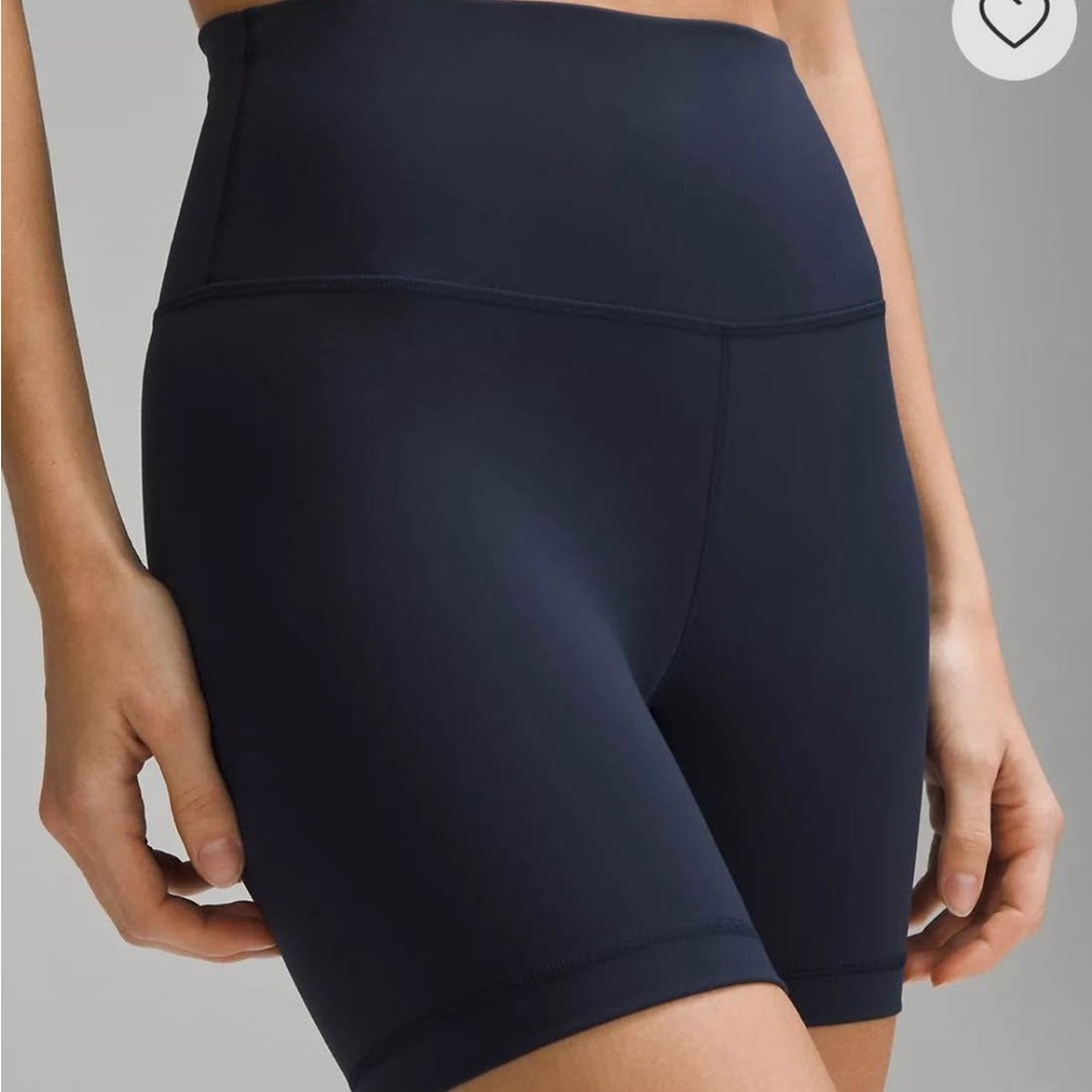 Lululemon Athletica Dark Blue high waisted Shorts with the price tag on